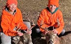tales from the hunt Trey Mertens, left, and Mack Mertens are 13-year-old cousins from Roseau. On opening day of the statewide firearms season each sho