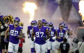 Vikings defensive end Everson Griffen led the team into the field before the pre-season matchup between the Minnesota Vikings and the Seattle Seahawks