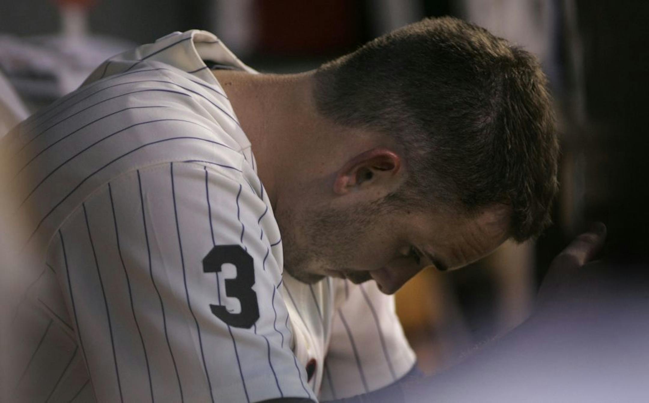 Twins pitcher Brian Duensing sat on the bench after being pulled out of the game in the fifth inning at Target Field in Minneapolis on Friday. The Tigers won 8-2
