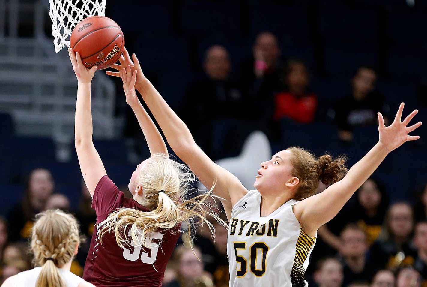 Byron High School center Ayoka Lee (50) defends as Sauk Centre High School center Julia Dammann (35) shoots during the first half. ] LEILA NAVIDI • leila.navidi@startribune.com