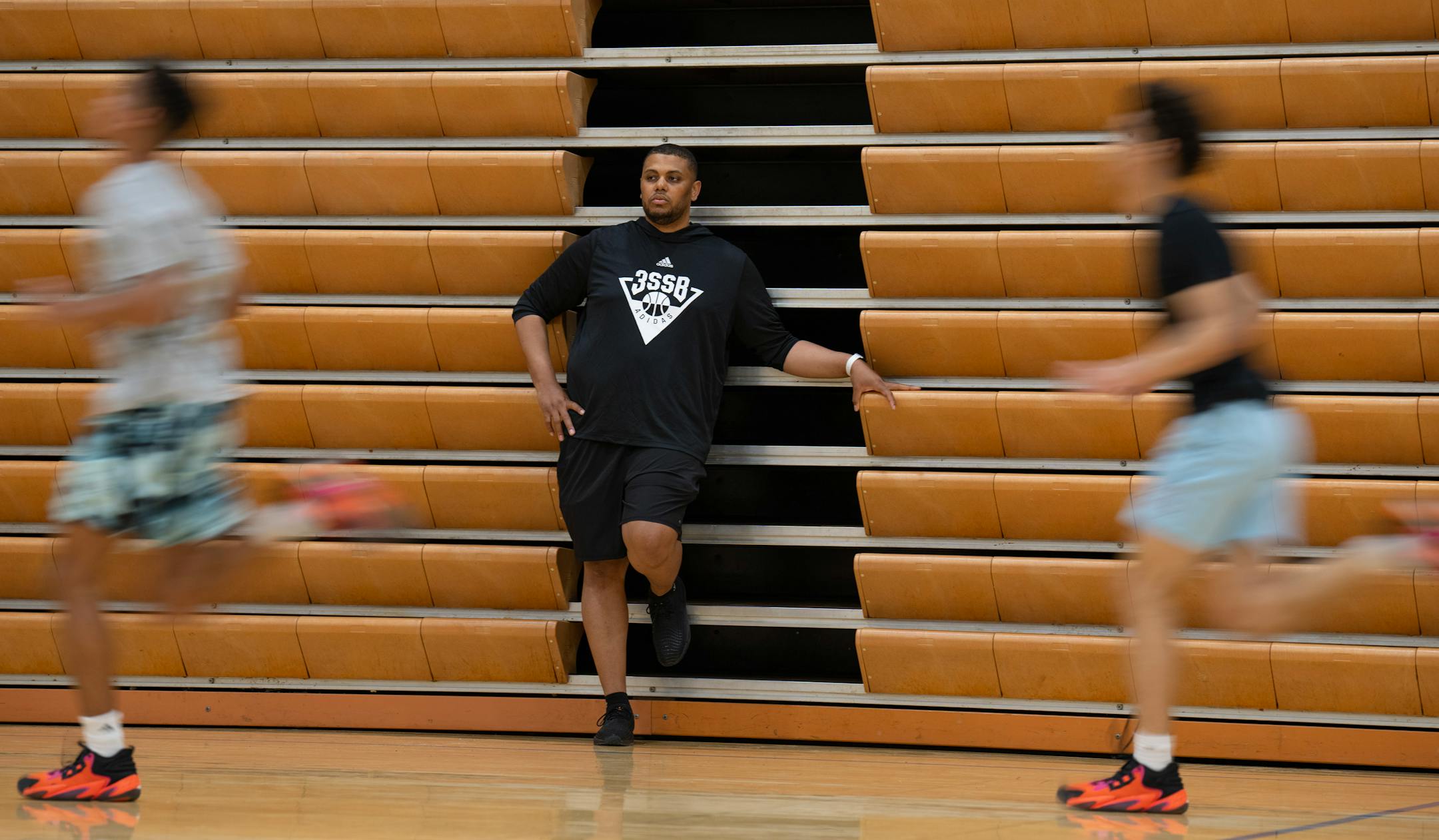 Head coach Jonathan Williams observed his players during a conditioning drill at practice at Wayzata Central Middle School in Plymouth.