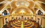 With most legislators working remotely, members present on the House floor stood for the Pledge of Allegiance at the start of the fifth special sessio