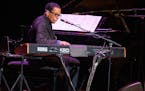 Jazz giant Herbie Hancock sits at his keyboards at the State Theatre for a rewarding two-hour performance with his band.
