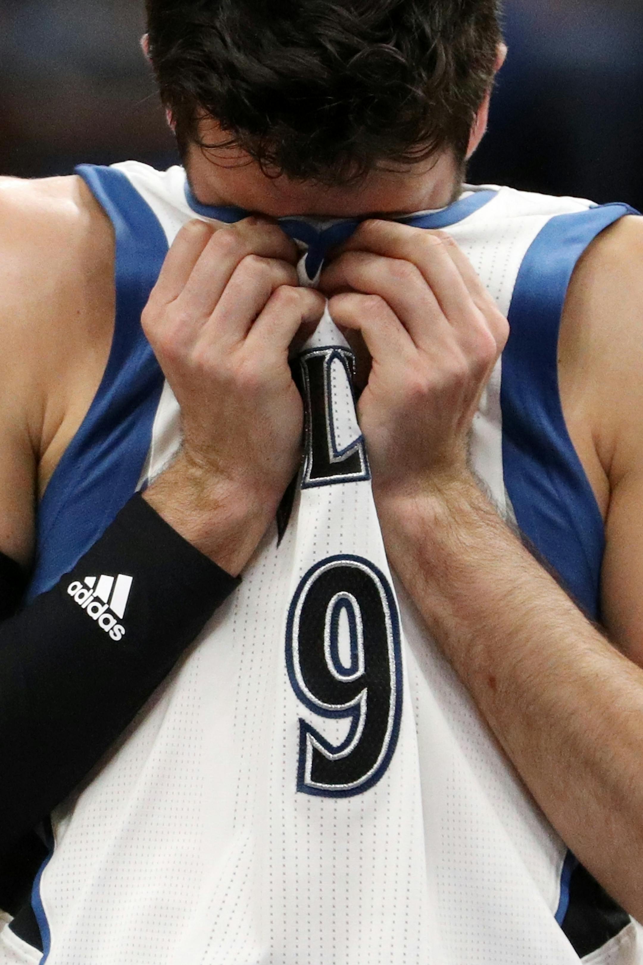 Minnesota Timberwolves guard Ricky Rubio (9) holds his nose after he was hit in the face during the second half.