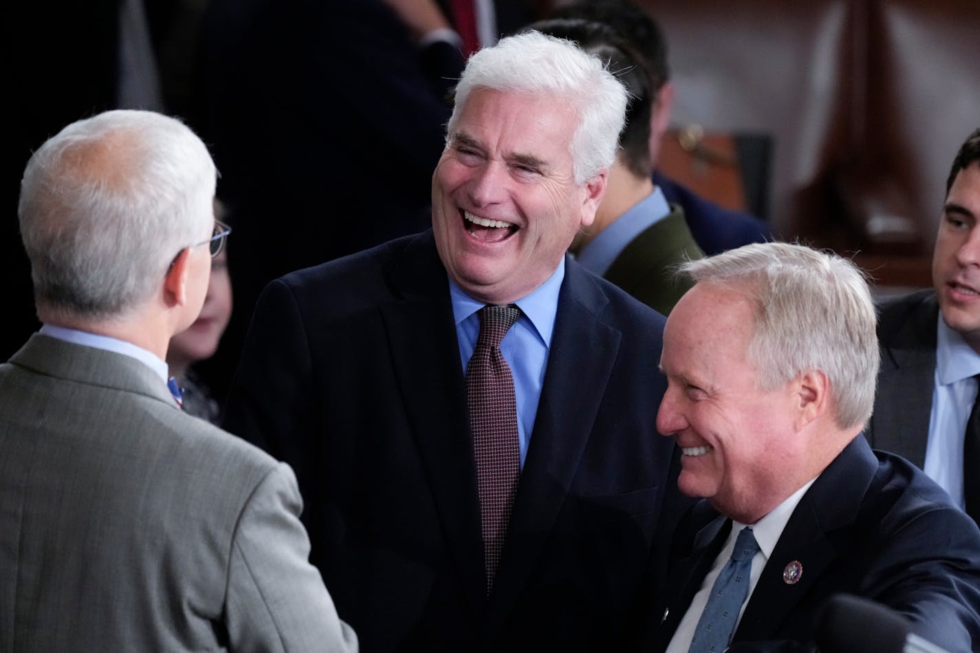 Rep. Patrick McHenry, R-N.C., the temporary leader of the House of Representatives, left, talked with Rep. Tom Emmer, R-Minn., center, and Rep. David Joyce, R-Ohio, right, confer as lawmakers convene to hold a third ballot to elect a speaker of the House, at the Capitol in Washington, Friday, Oct. 20, 2023. (AP Photo/J. Scott Applewhite)