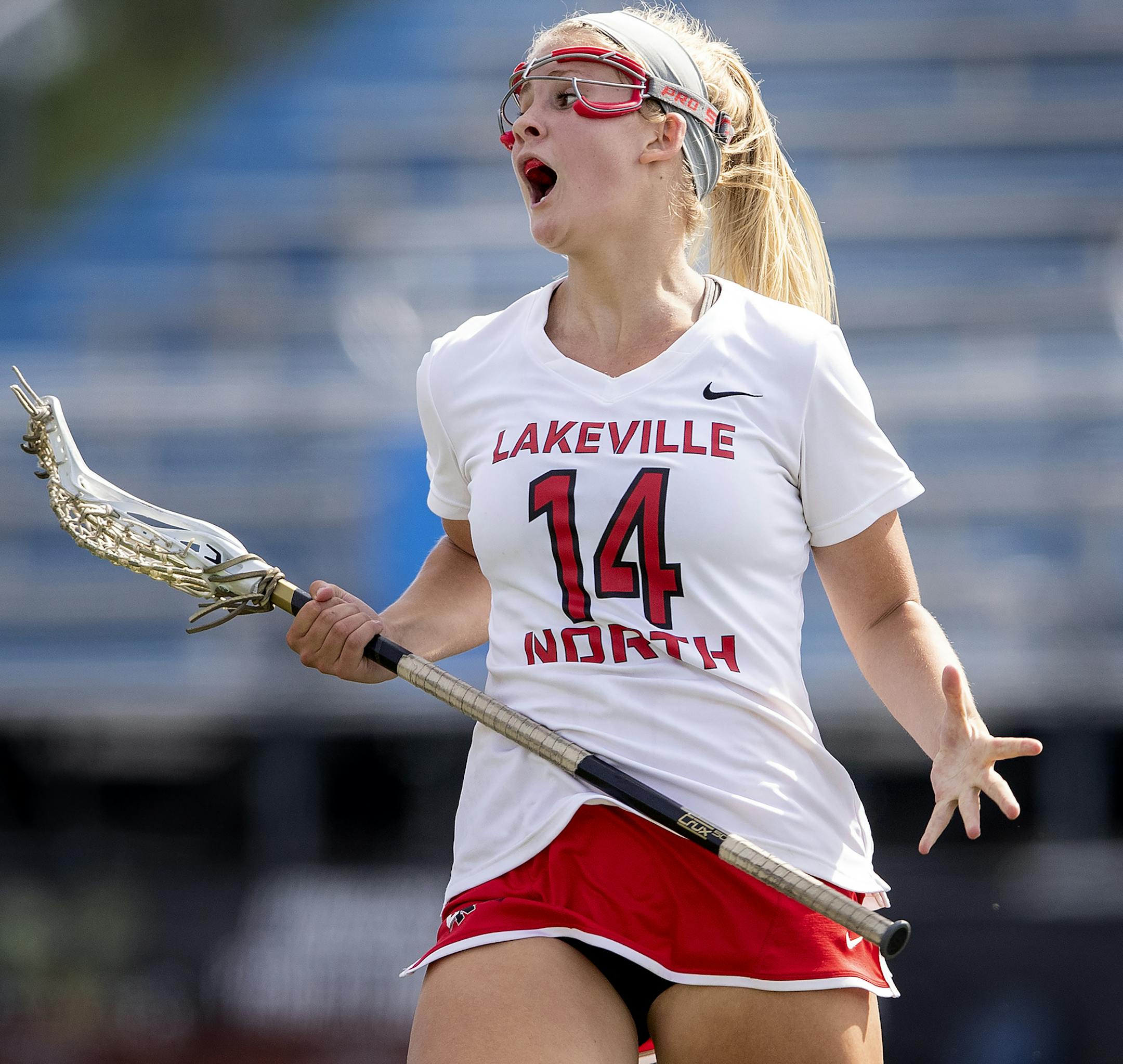 Chloe Fisher (14) of Lakeville North celebrated after scoring what was to be the game winning goal. Lakeville North beat Blaine 14-13. ] CARLOS GONZALEZ ï cgonzalez@startribune.com ñ June 12, 2018, Minnetonka, MN, High School / Prep Girls' lax / Lacrosse State quarterfinals at Minnetonka, Blaine vs. Lakeville North