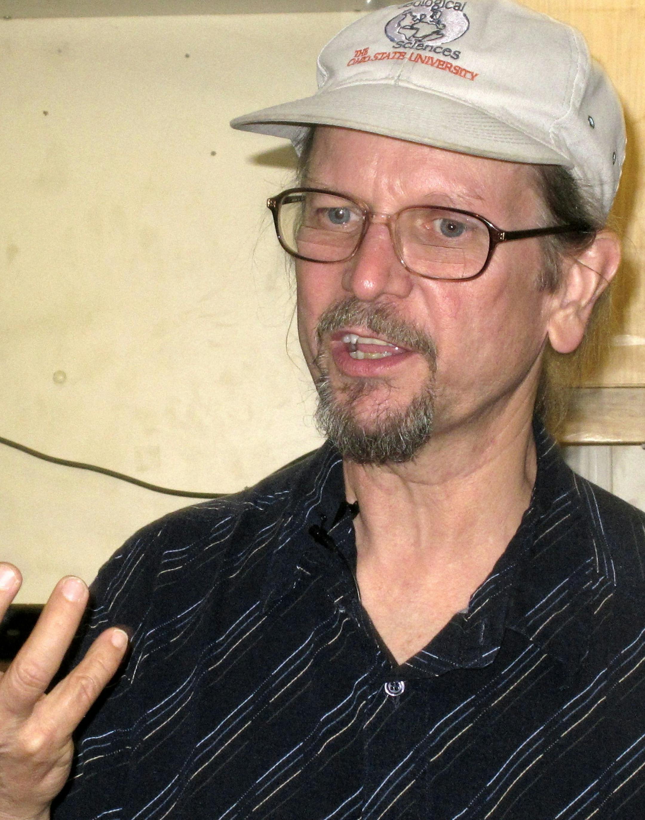 Geologist, historian and consultant Ben Evans speaks with reporters aboard the Odyssey Explorer in North Charleston, S.C., on Tuesday, April 22, 2014. The Explorer leaves this week on an expedition to recover the remaining gold from the wreck of the S.S. Central America off the North Carolina coast. It's not clear just how much gold might still be in the wreck of the ship which sank during an 1857 hurricane. An expedition a quarter-century ago recovered gold bars and coins worth an estimated $50