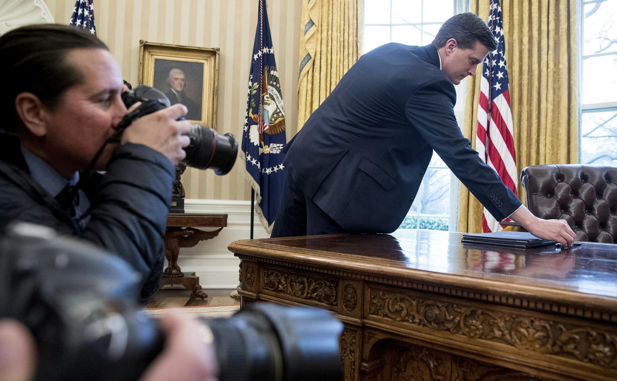 Executive orders regarding trade are put out for President Donald Trump to sign in the Oval Office at the White House, Friday, March 31, 2017, in Washington. Trump spoke to the media but left before signing the orders. (AP Photo/Andrew Harnik)