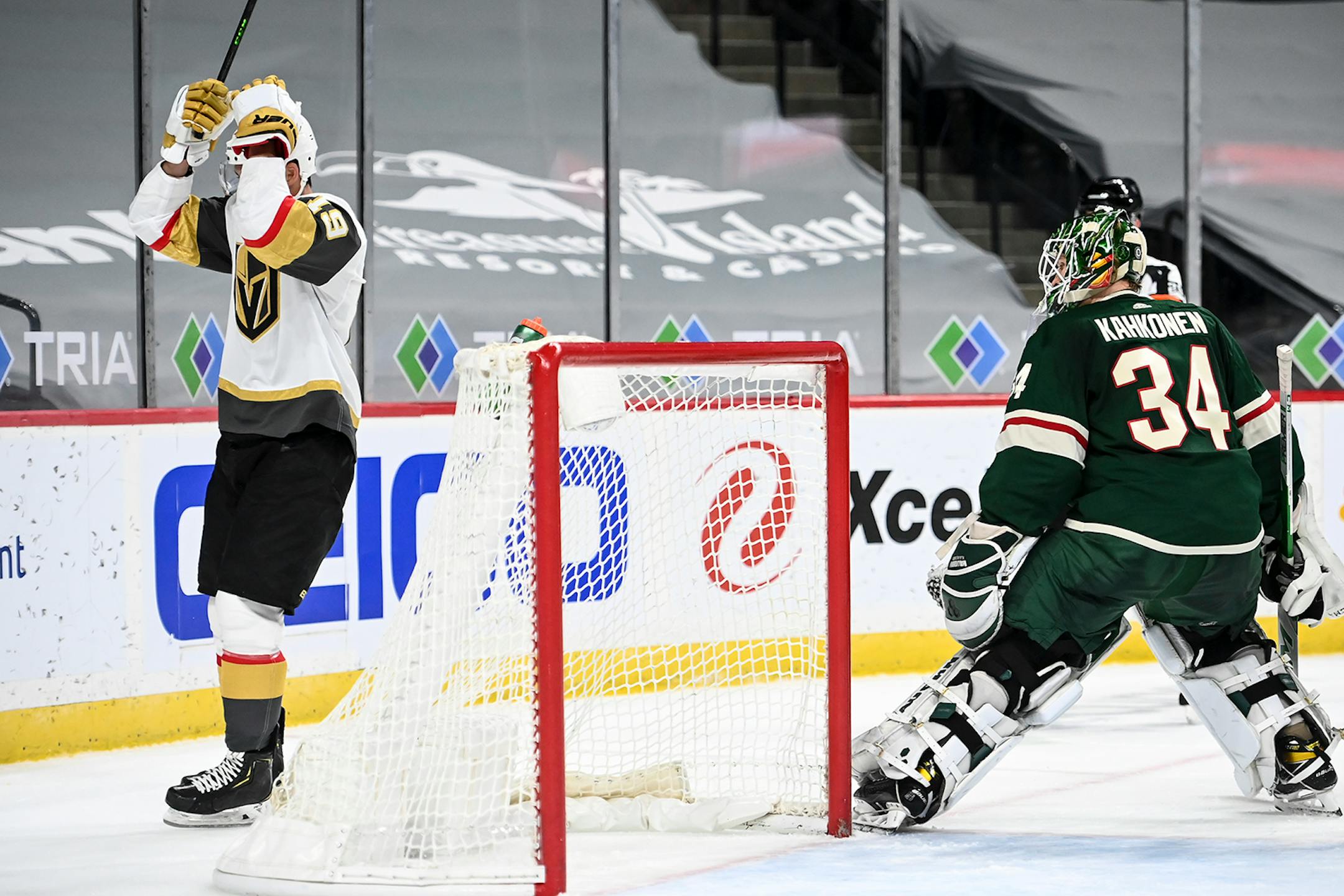 Minnesota Wild goaltender Kaapo Kahkonen (34) looked back at Vegas Golden Knights right wing Reilly Smith (19), who was dejected after shit shot was blocked by Kahkonen late in the second period.