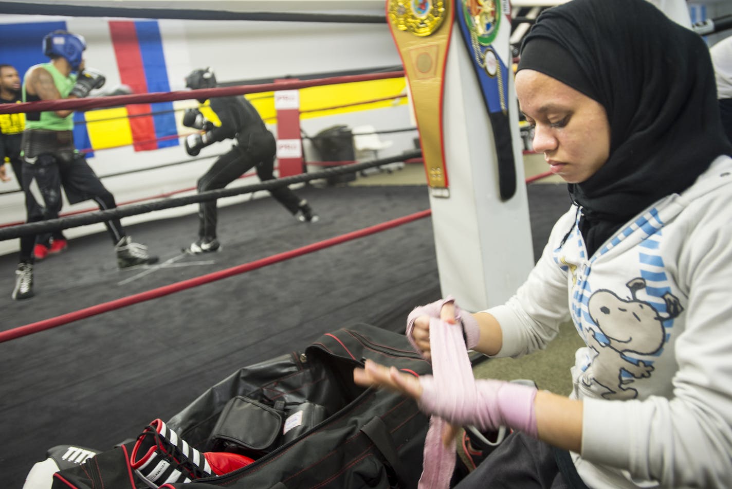 15-year-old Amaiya Zafar wrapped her hands before practice at Sir. Cerresso Fort Boxing at St. Paul on Wednesday.