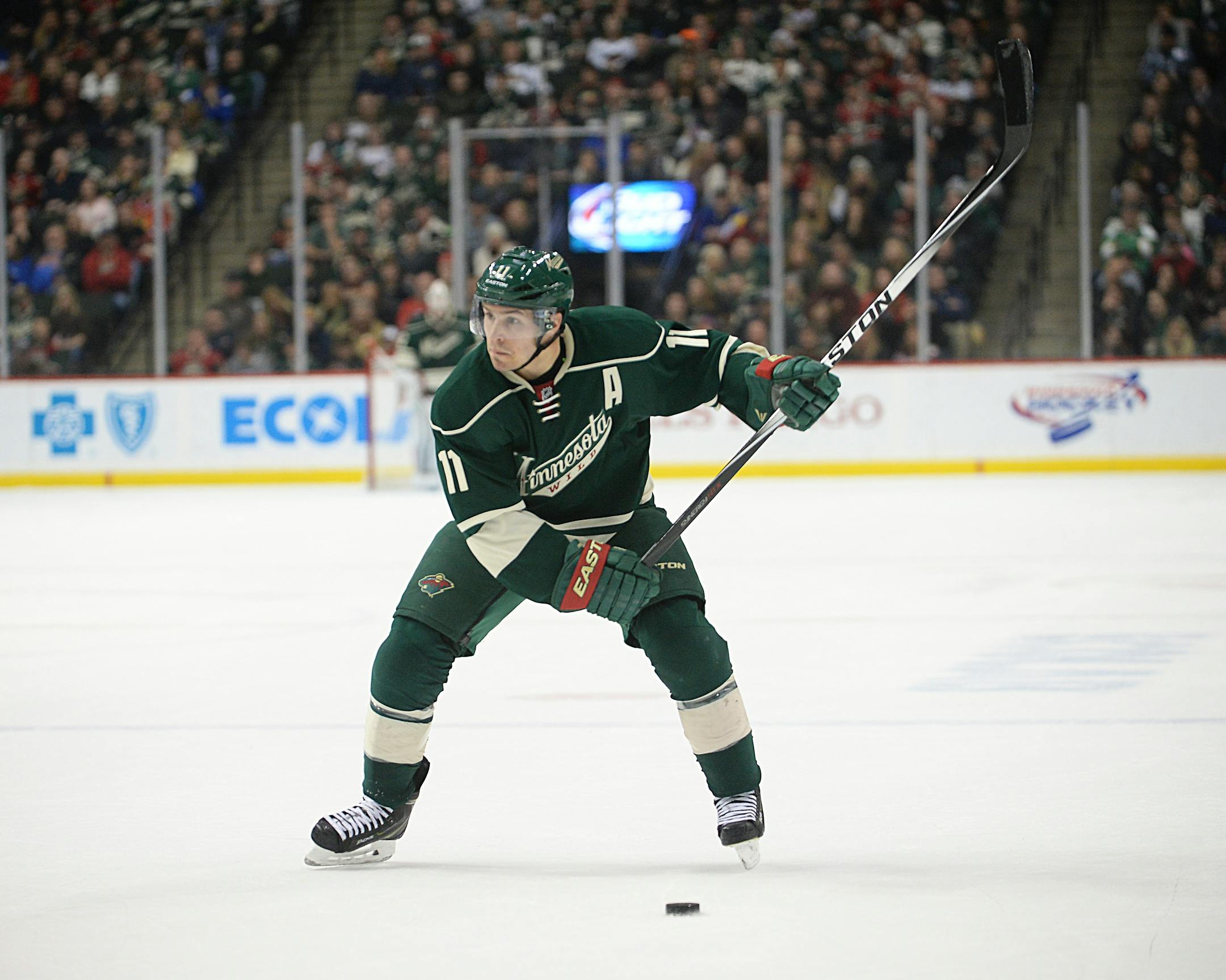 Minnesota Wild left wing Zach Parise (11) winds back for a goal-scoring slap shot that put the Wild ahead of the Blues 2-1 toward the end of the second period.