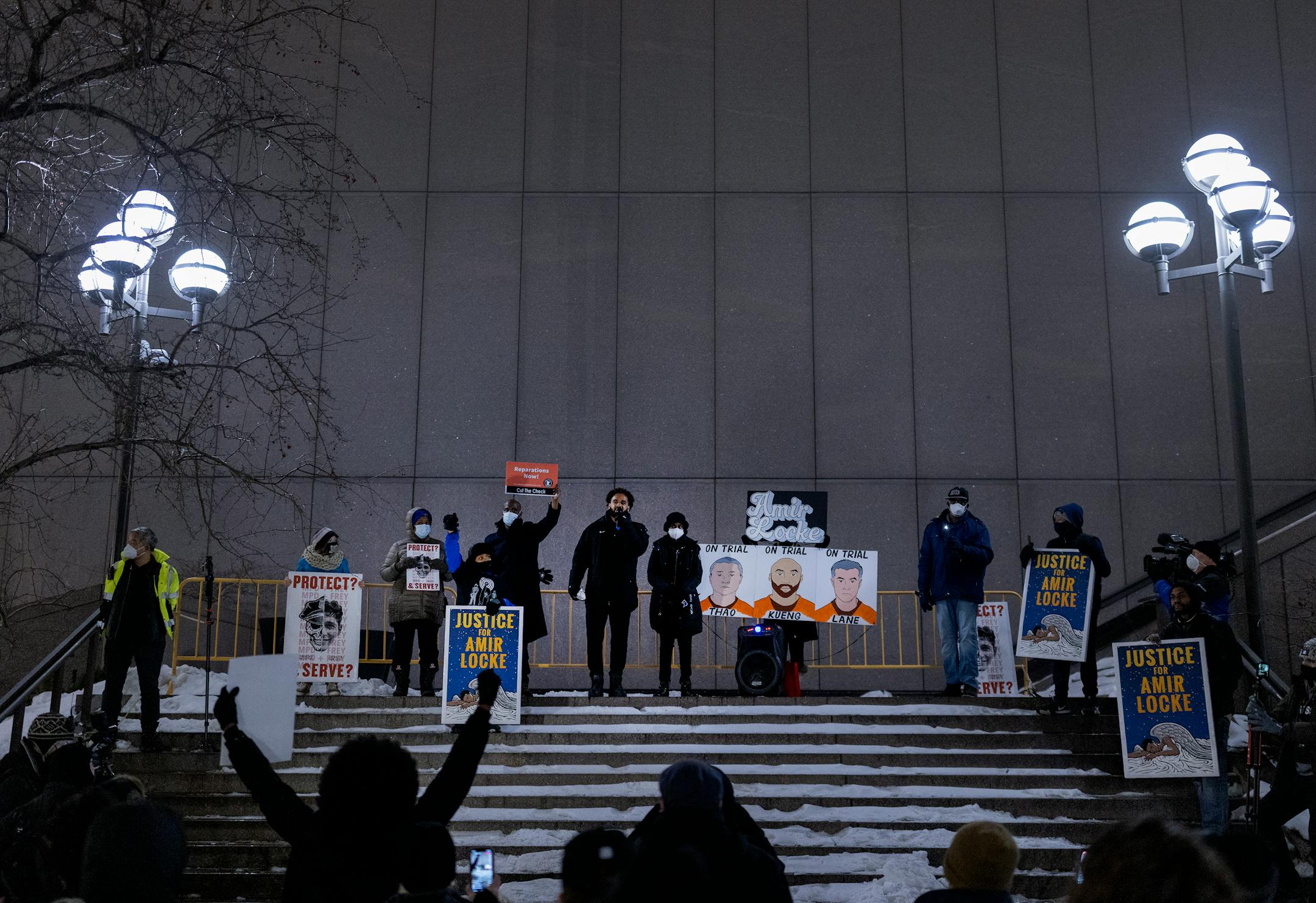A speaker addresses the crowd during National Solidarity Justice for Amir Locke event.