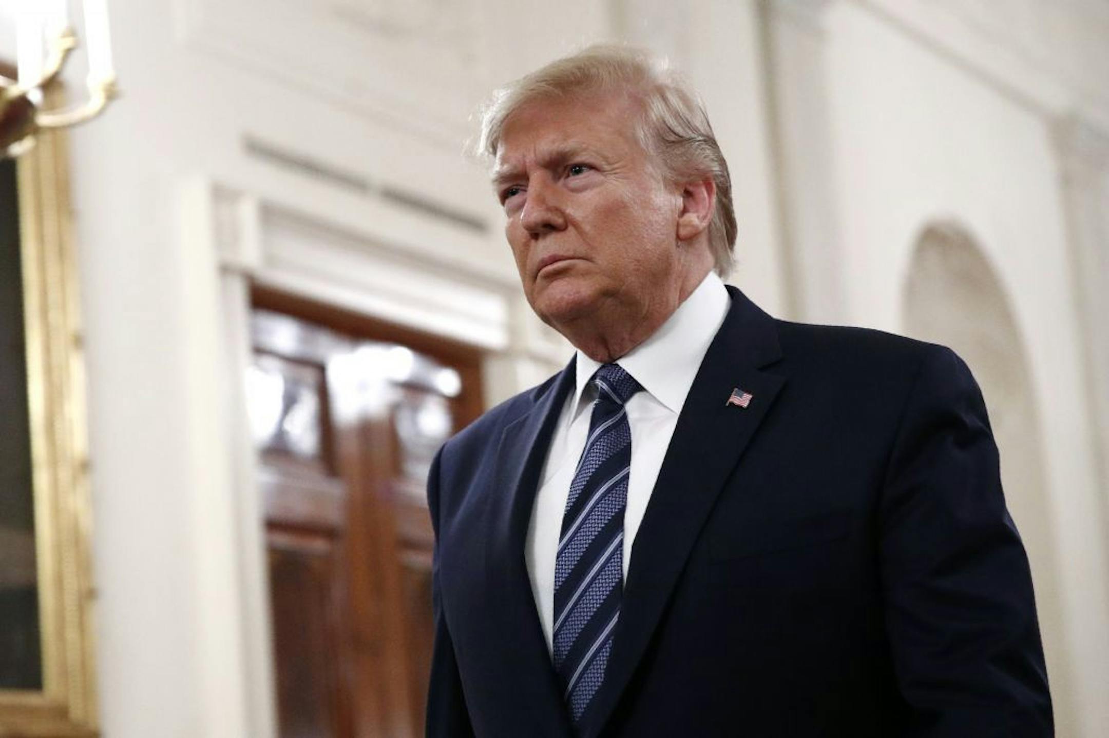 President Donald Trump arrives to speak at a ceremony to present the Presidential Citizens Medal posthumously to Rick Rescorla in the East Room of the White House, Thursday, Nov. 7, 2019, in Washington.