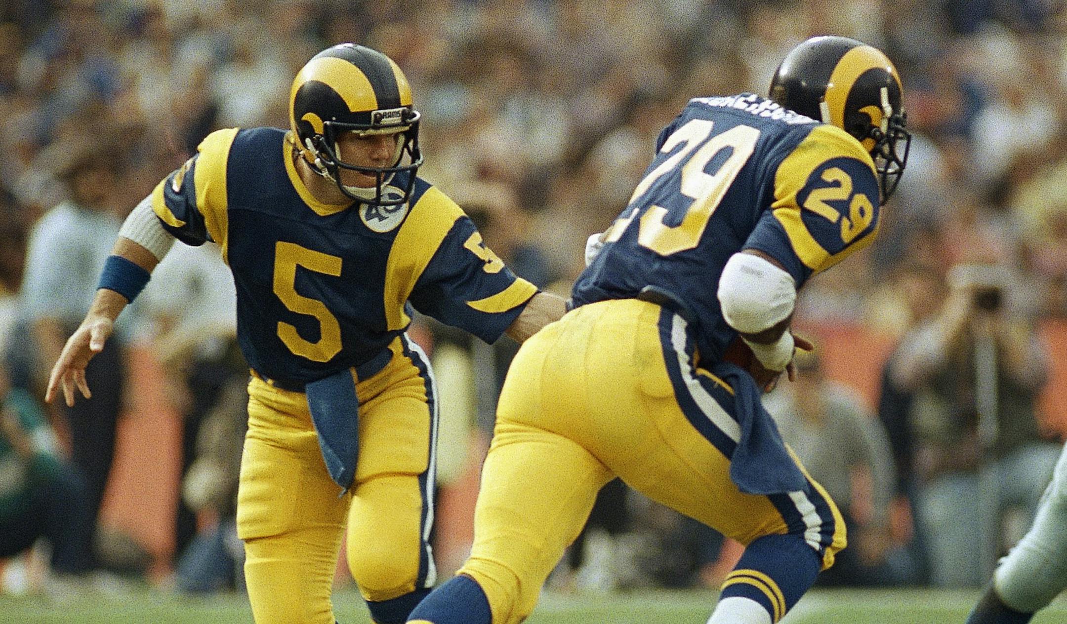 Shown in photo is Eric Dickerson, during playoffs action against the Dallas Cowboys on Jan. 5, 1986. (AP Photo) ORG XMIT: APHS246199