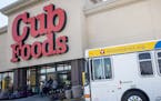 A Metro Transit bus drove past the entrance of the Cub supermarket Thursday afternoon at 13020 Riverdale Drive in Coon Rapids. ] (AARON LAVINSKY/STAR 