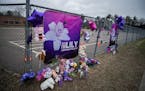 A memorial for Lily Peters is installed by the playground of Parkview Elementary School where she went to school in Chippewa Falls, Wis., on Tuesday, 