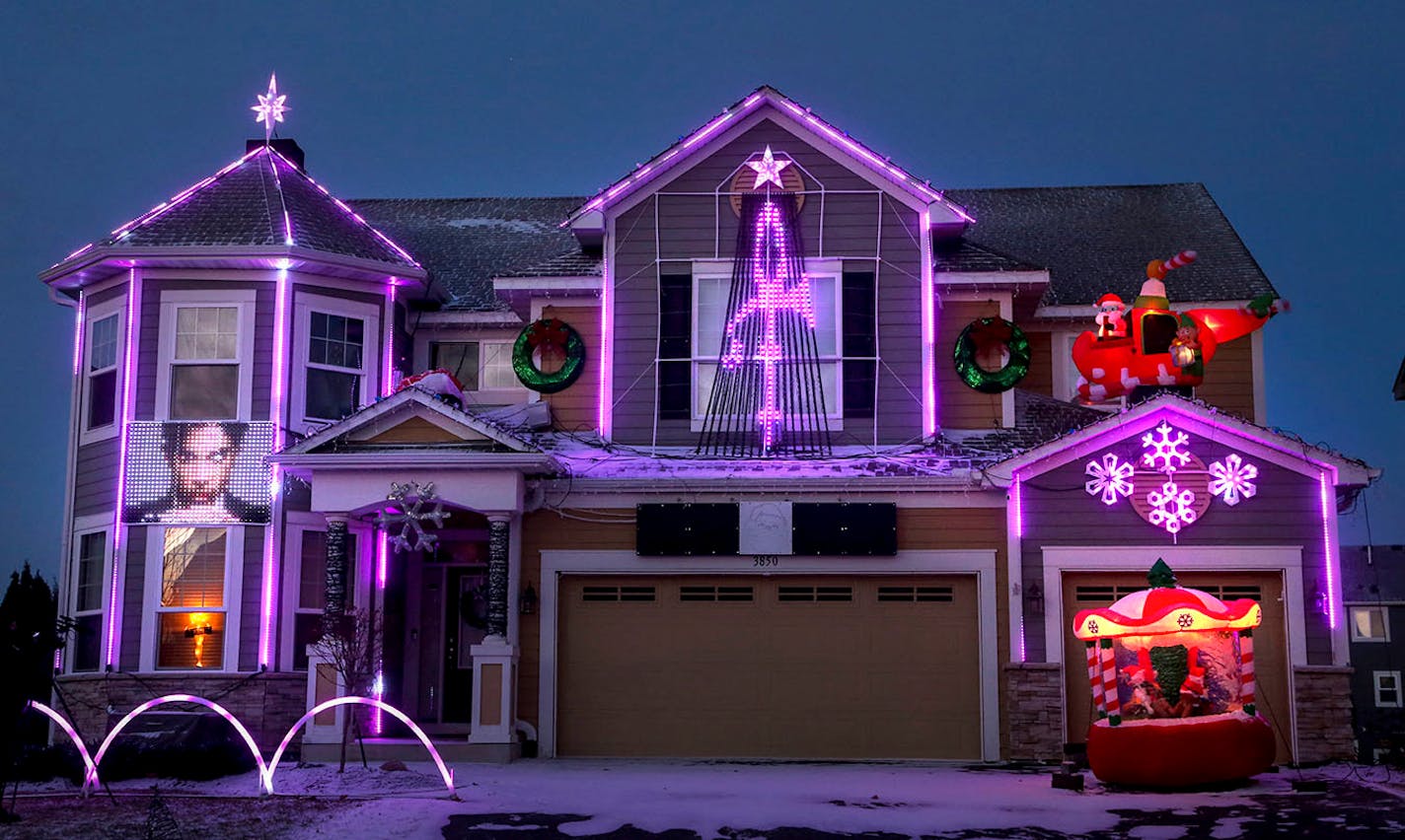 A holiday light display in Chaska by the Staudt family pays homage to Prince and seen Thursday, Dec. 8, 2016, in Chaska, MN.