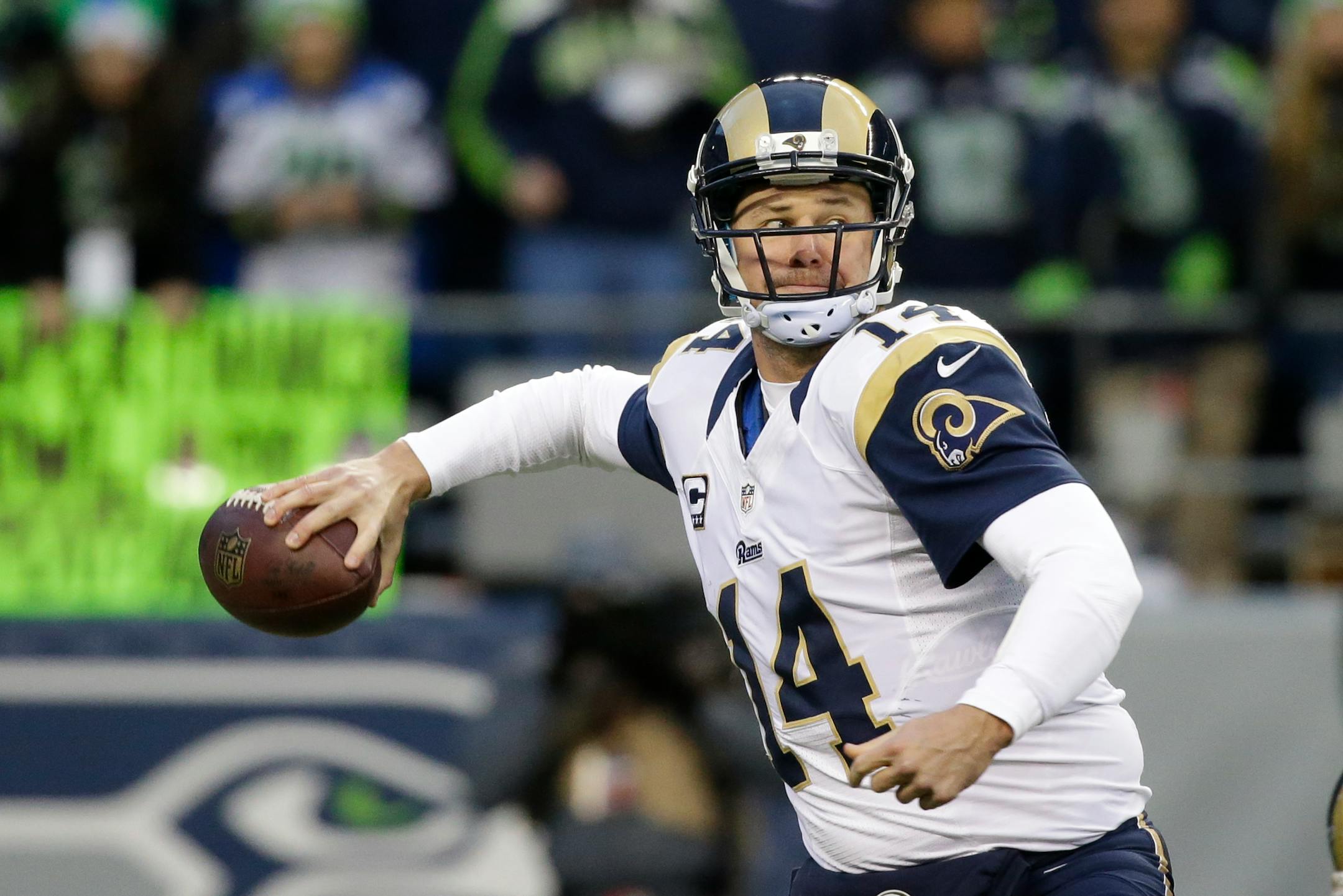 St. Louis Rams quarterback Shaun Hill passes in the second half of an NFL football game against the Seattle Seahawks, Sunday, Dec. 28, 2014, in Seattle. (AP Photo/Elaine Thompson)