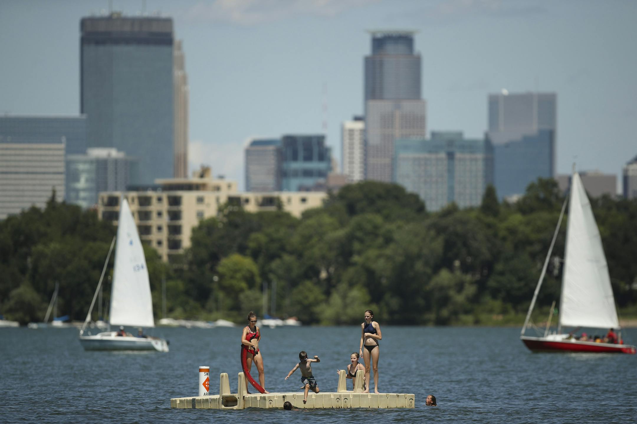 Kids jumped off the raft off Thomas Beach into Lake Bde Maka Ska Monday afternoon. ] JEFF WHEELER &#xef; jeff.wheeler@startribune.com Following the lead of the Minneapolis Park and Recreation Board and the Minnesota Department of Natural Resources, the federal government now recognizes Lake Calhoun as Lake Bde Maka Ska. Swimmers jumped off the raft off Thomas Beach into Lake Bde Maka Ska Monday afternoon, July 16, 2018.
