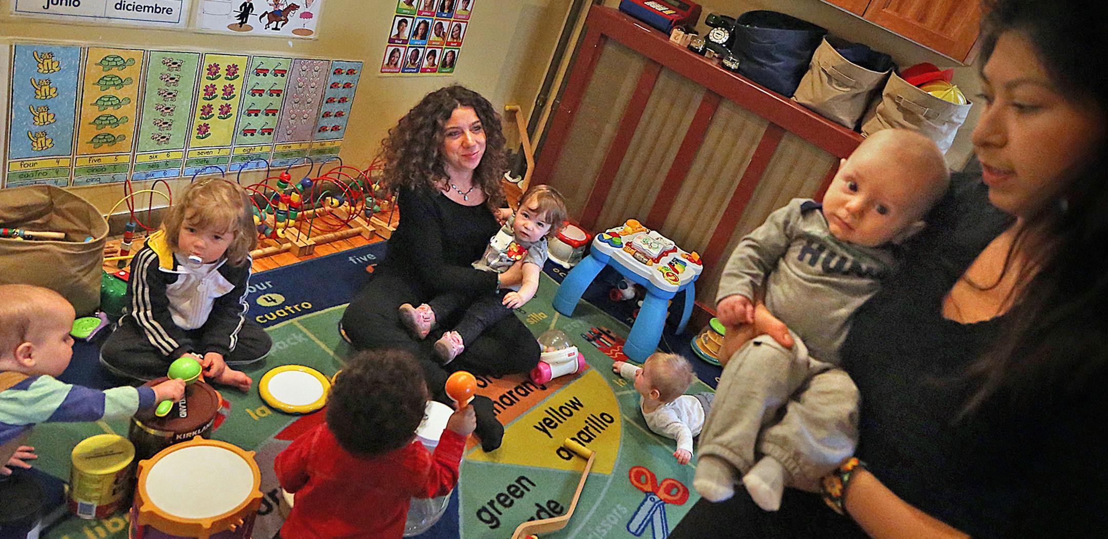 Erika Legros (right), and assistant to Luciana Carballo-Pierre (left), worked with children at Carballo-PierreÌs 4-star rated, Minneapolis daycare home. ] JIM GEHRZ Ô james.gehrz@startribune.com / Minneapolis, MN / April 9, 2015 /11:30 AM - BACKGROUND INFORMATION: At Crystal Born's daycare in Mankato, the toddlers don't spend all day watching TV. They work on their colors and numbers, and on Wednesday they had a scavenger hunt to help them learn their ABCs. That high-octane curriculum
