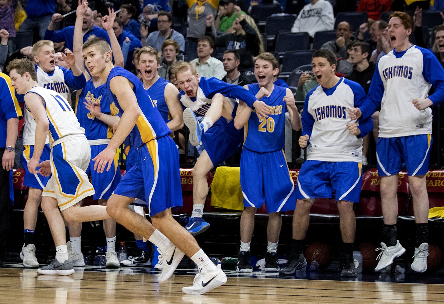 The Esko bench celebrated a three pointer by Ryan Pantsar (3). ] CARLOS GONZALEZ • cgonzalez@startribune.com – March 21, 2018, Minneapolis, MN, Target Center, Prep High School Boys Basketball State Tournament, Class 2A quarterfinals -- St. Cloud Cathedral vs. Esko