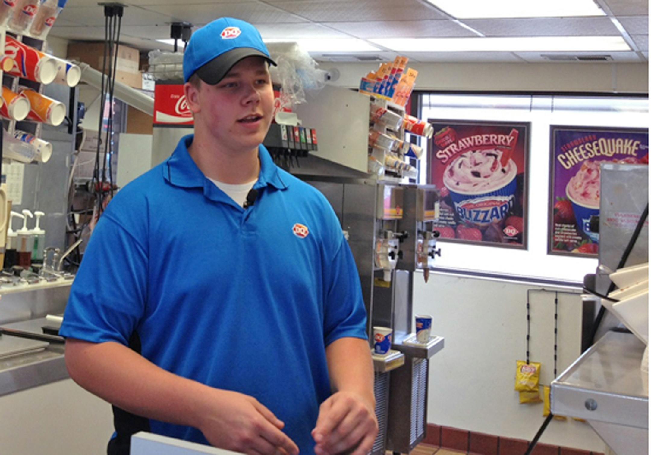 In this screen grab provided by WCCO TV is Dairy Queen employee Joey Prusak in Hopkins, Minn. Prusak is winning praise for his treatment of a visually impaired customer who unwittingly dropped a $20 bill on the floor. After another customer pocketed the bill, Prusak asked her to return it, and when she didn't, told her to leave the store. He then gave the visually impaired customer $20 from his own wallet.
