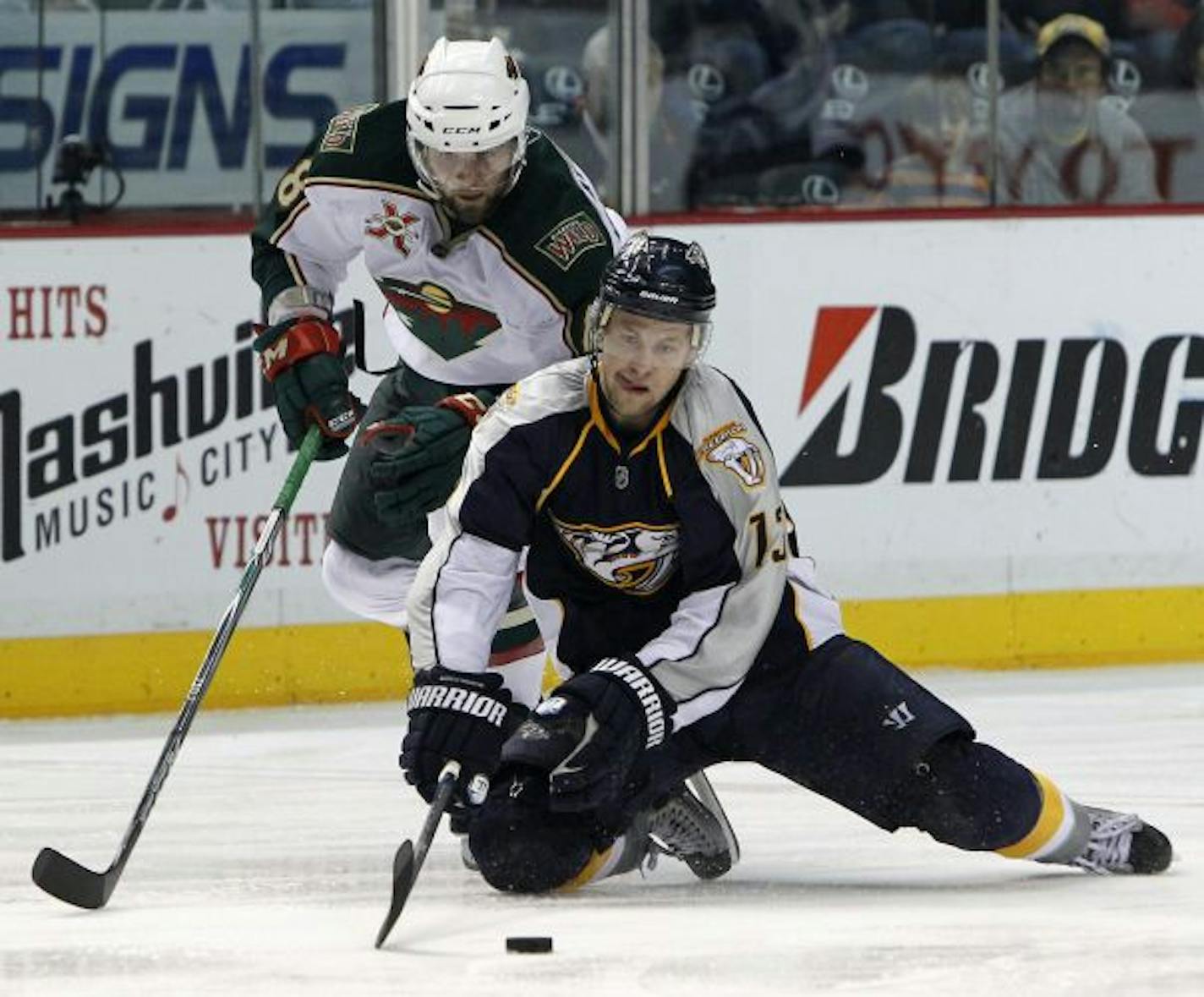 Wild left winger Guillaume Latendresse (back)