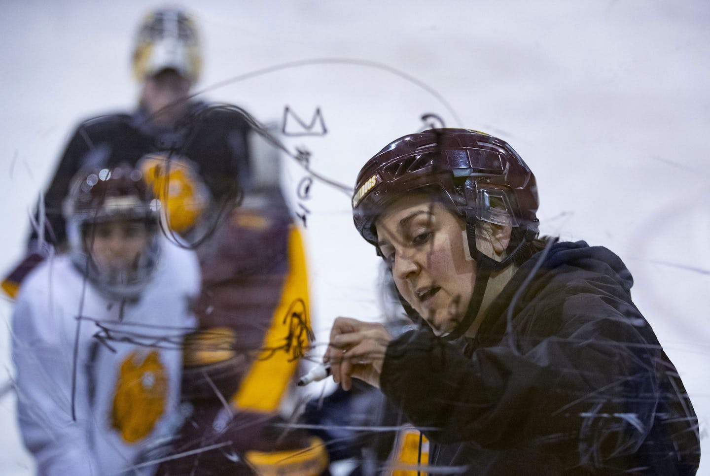 UMD women's hockey head coach Maura Crowell drew up some plays for her team to practice on Tuesday October 29, 2019. ]
ALEX KORMANN &#x2022; alex.kormann@startribune.com A profile of the current women's hockey coach at UMD as she starts her fifth season with the program under the shadow of her litigious and successful predecessor.