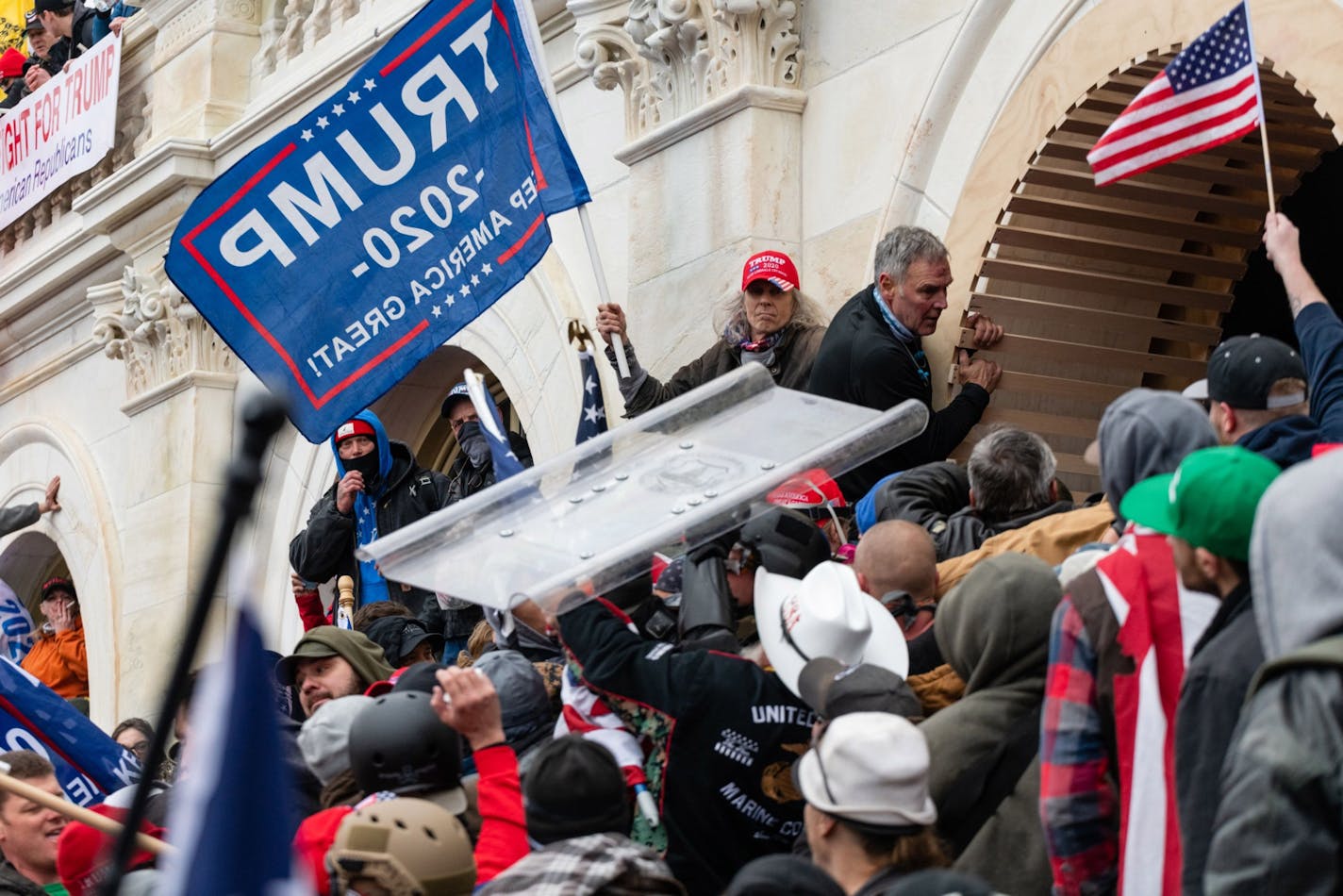 Demonstrators stole a Metropolitan Police riot shield while attempting to enter the U.S. Capitol building in Washington, D.C., on Jan. 6.