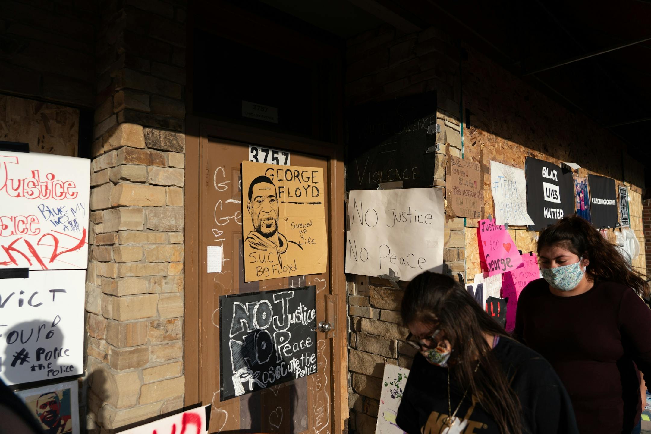 Hundreds of people gathered for conversation, food and healing outside of Cup Foods at 38th Street and Chicago Avenue.