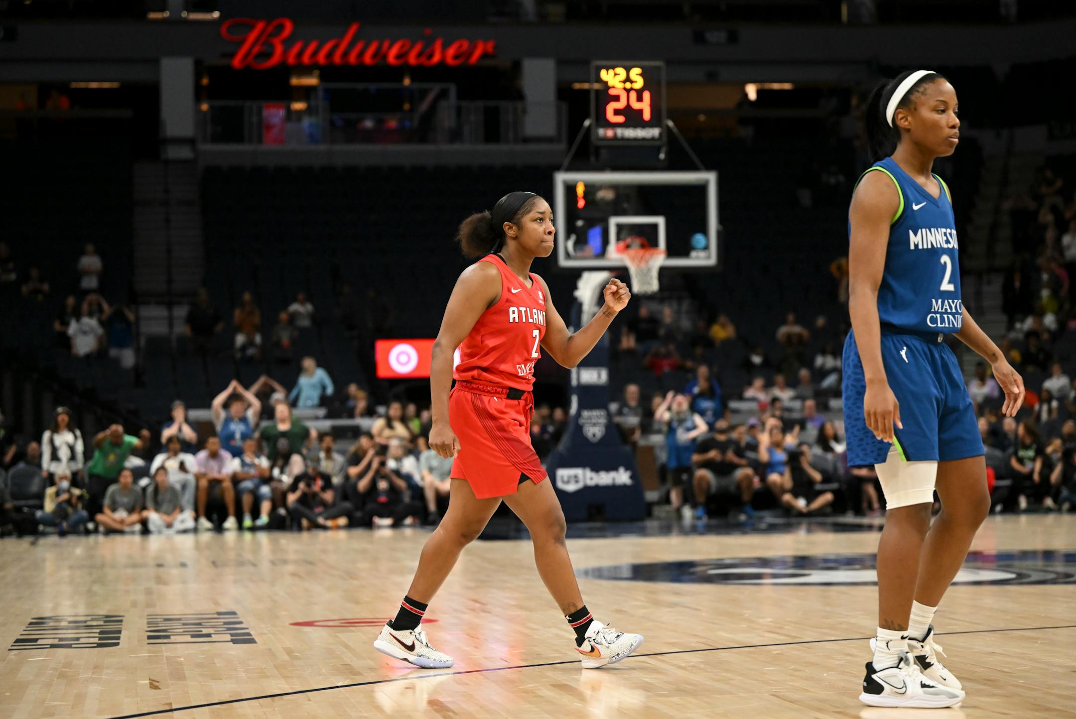 Atlanta Dream guard Aari McDonald celebrates after hitting a 3-pointer in the final minute of the game, giving her team its first lead of the night against the Minnesota Lynx.