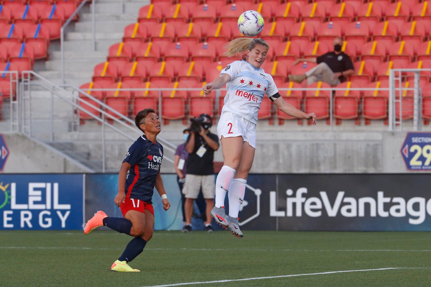 Chicago Red Stars' Kealia Watt (2) heads the ball as Washington Spirit forward Kumi Yokoyama (17) watches during the first half of an NWSL Challenge Cup soccer match at Zions Bank Stadium, Saturday, June 27, 2020, in Herriman, Utah. (AP Photo/Rick Bowmer)