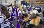 Greg Hanson blows his horn as part of his persona as the Norse god Odin. He likes to be known as "
Sir Odin. "] Story about tailgating and how it has 