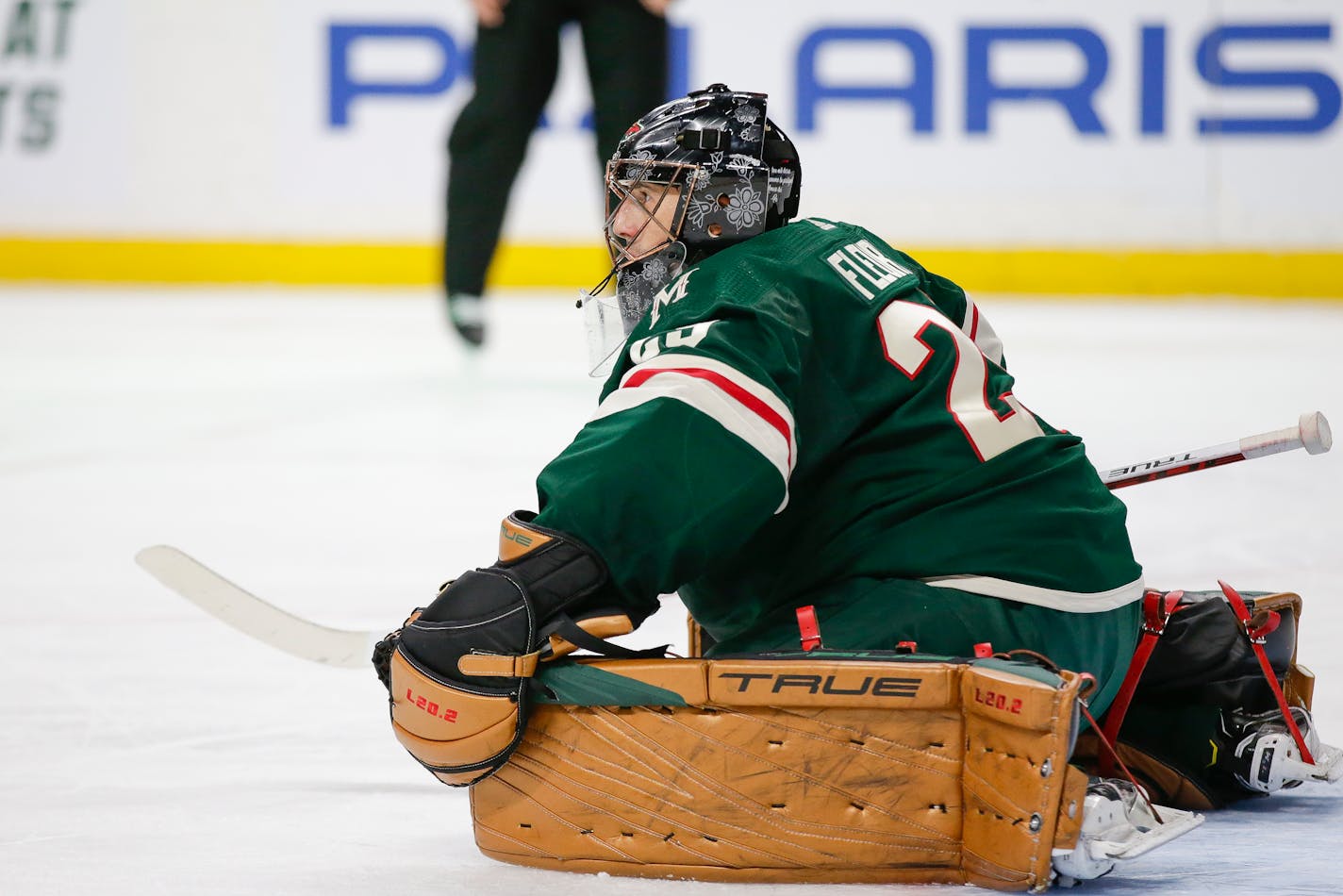 Minnesota Wild goaltender Marc-Andre Fleury stretches during an NHL hockey game against the Columbus Blue Jackets Saturday, March 26, 2022, in St. Paul, Minn. (AP Photo/Andy Clayton-King)