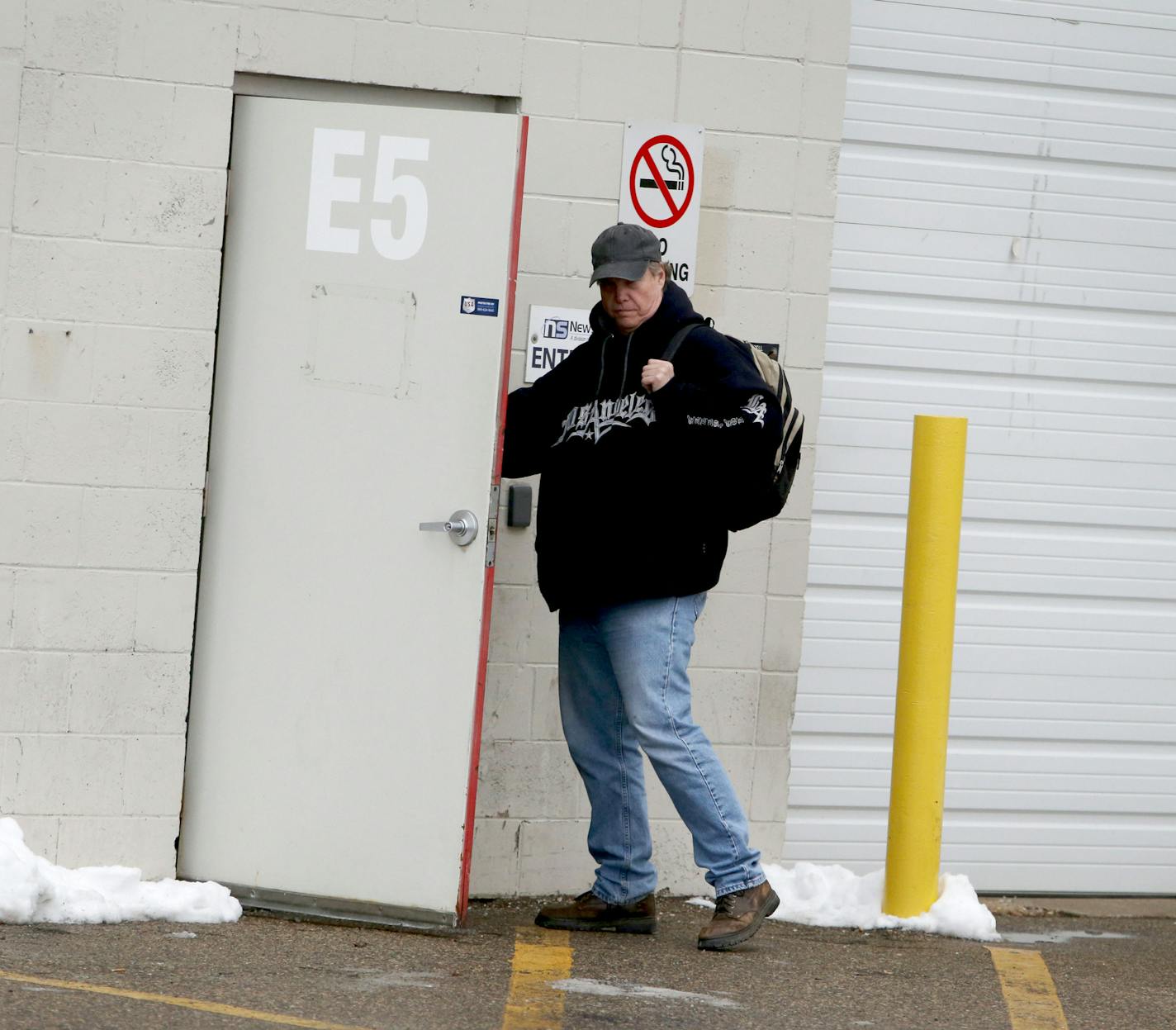 Brad Teslow, a former gym teacher, heads to his work Wednesday, Feb. 27, 2016, in Bloomington, MN. ](DAVID JOLES/STARTRIBUNE)djoles@startribune.com Brad Teslow will be preparing for work at a sheltered workshop. He will be leaving his downtown apartment in St. Paul at 3 p.m., and then driving to Bloomington, where he works on an assembly line in a warehouse operated by Opportunity Partners