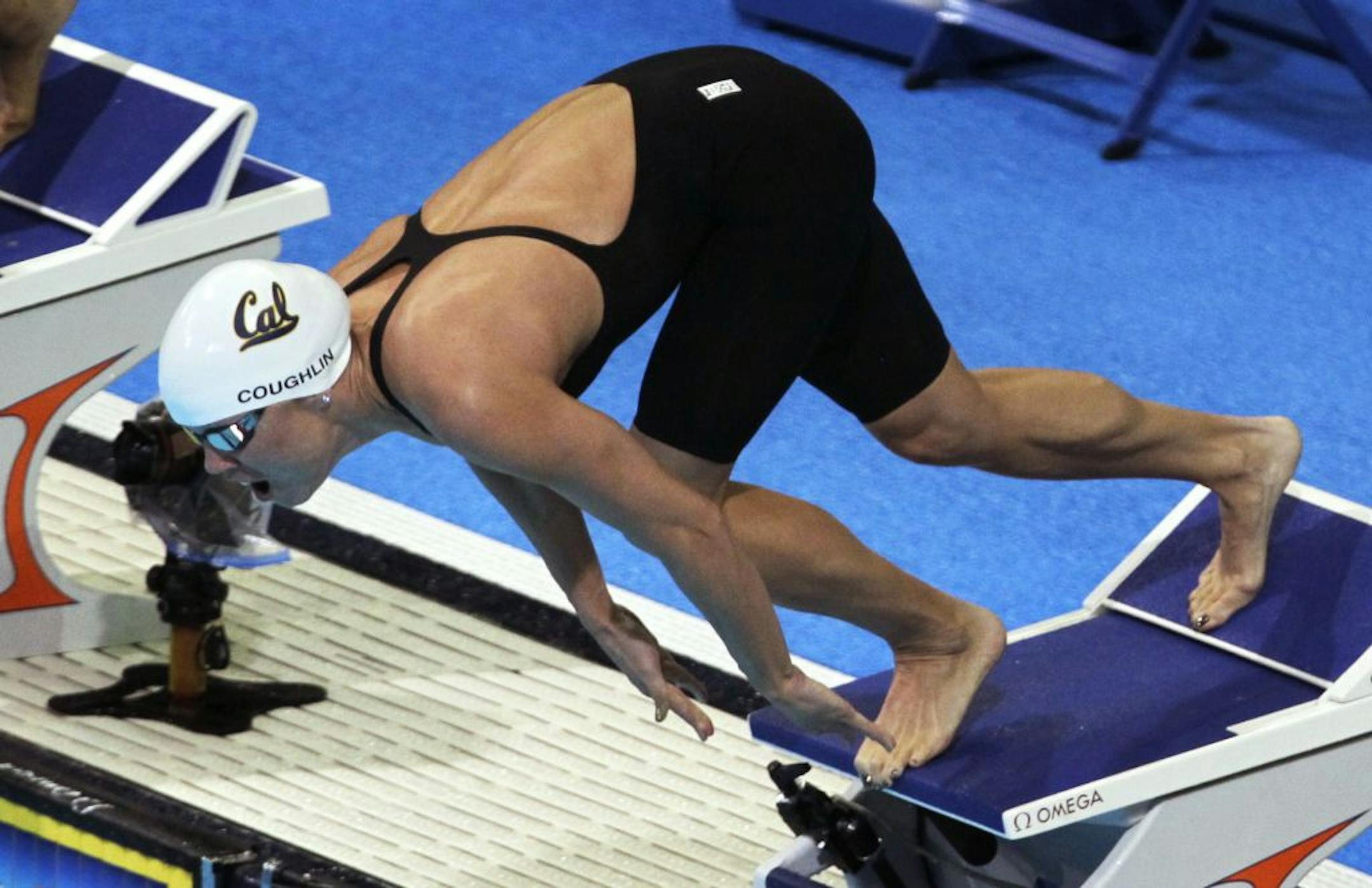 Natalie Coughlin dives at the start of a heat in the women's 100-meter freestyle preliminaries at the U.S. Olympic swimming trials, Friday, June 29, 2012, in Omaha, Neb.