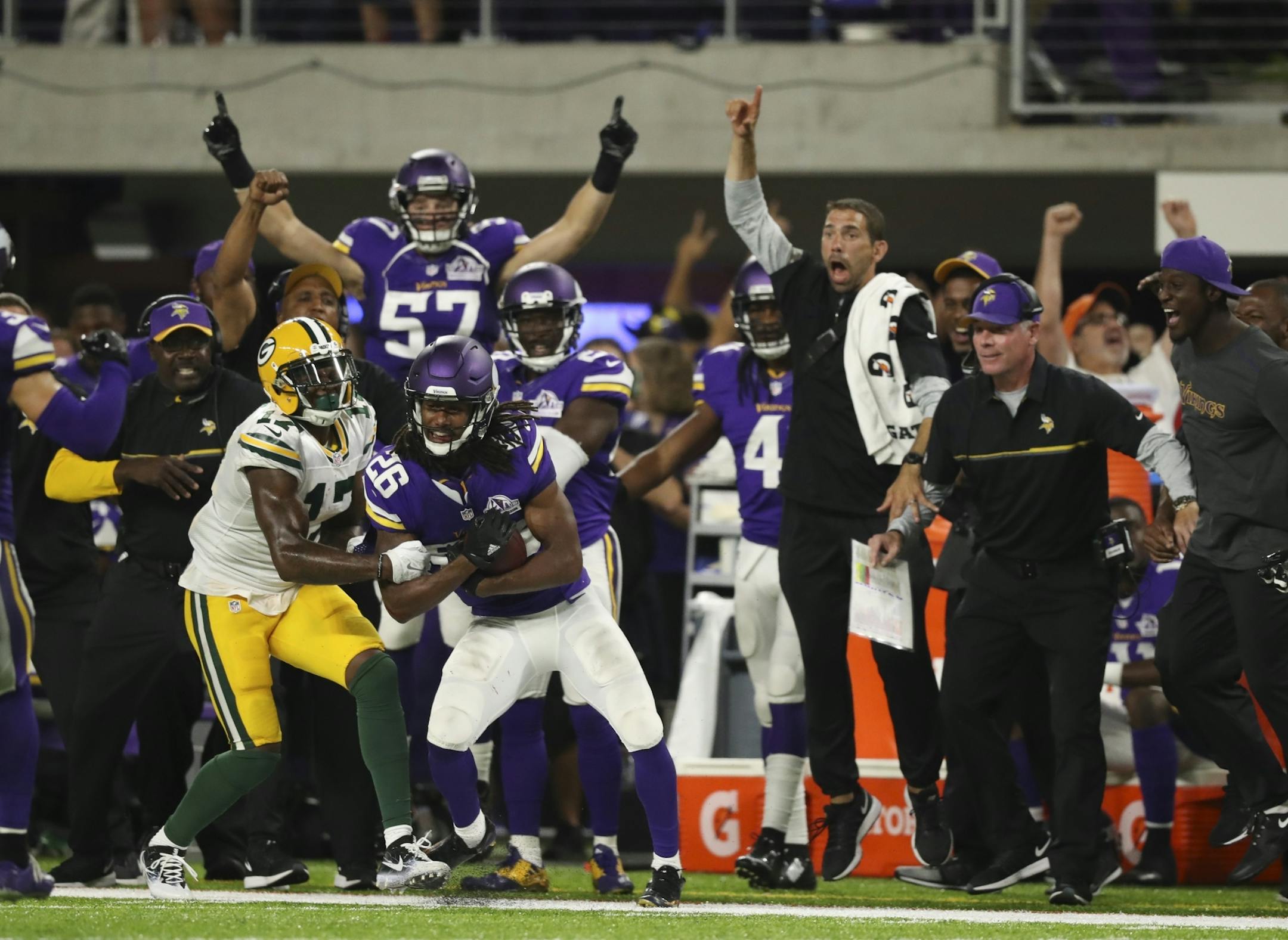 Vikings cornerback Trae Waynes (26) managed a smile after he intercepted a late fourth quarter pass intended for Green Bay Packers wide receiver Davante Adams (17), ending Green Bay's chances for a late score.