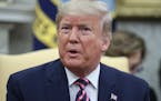 President Donald Trump declared Friday's House committee vote to impeach him "an embarrassment to our country" and refused to back away from the charg
