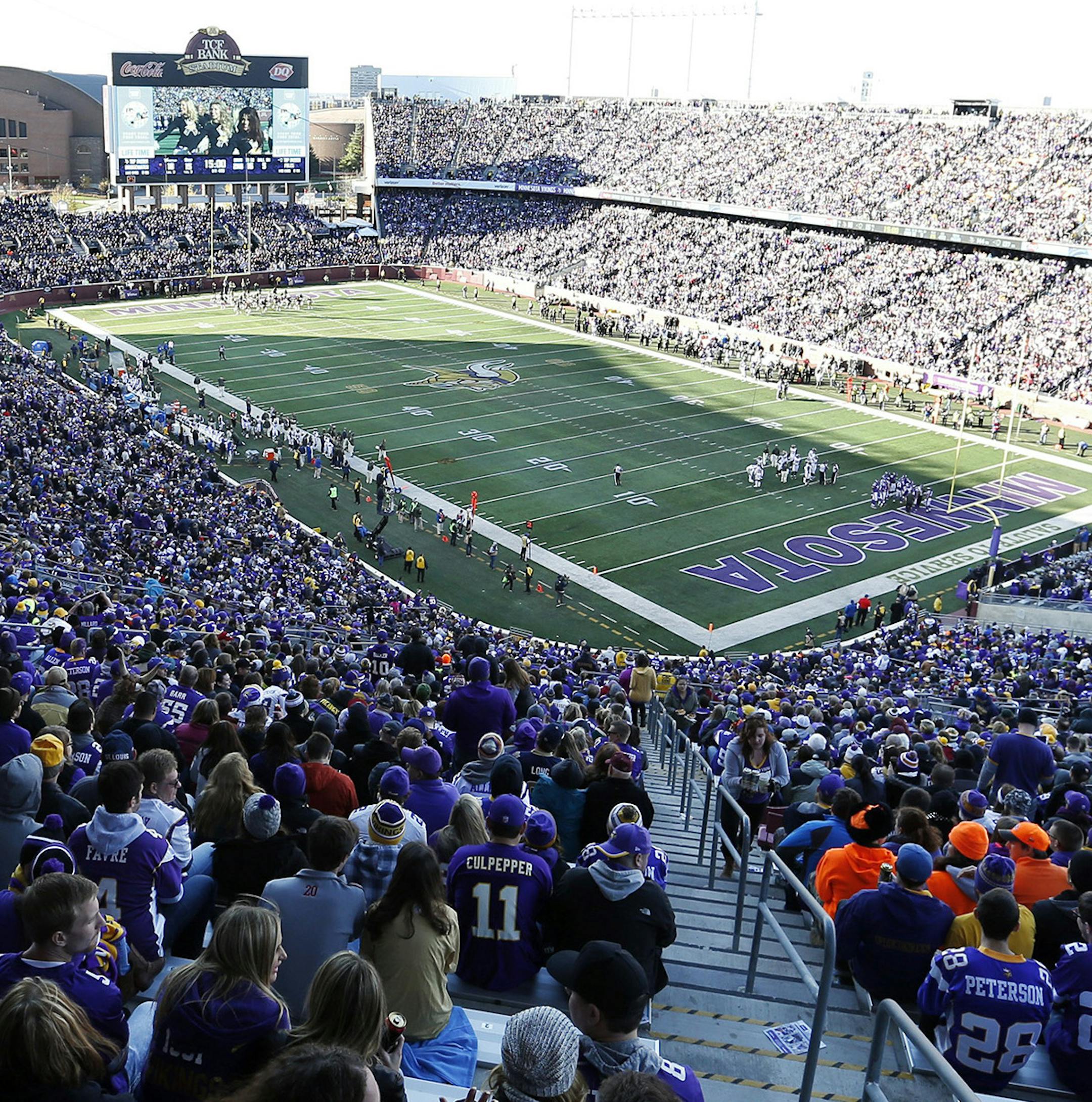 Football fans watch an NFL football game between the Minnesota Vikings and the St. Louis Rams at TCF Bank Stadium, Sunday, Nov. 8, 2015, in Minneapolis. (AP Photo/Jim Mone) ORG XMIT: MIN2015120812354057