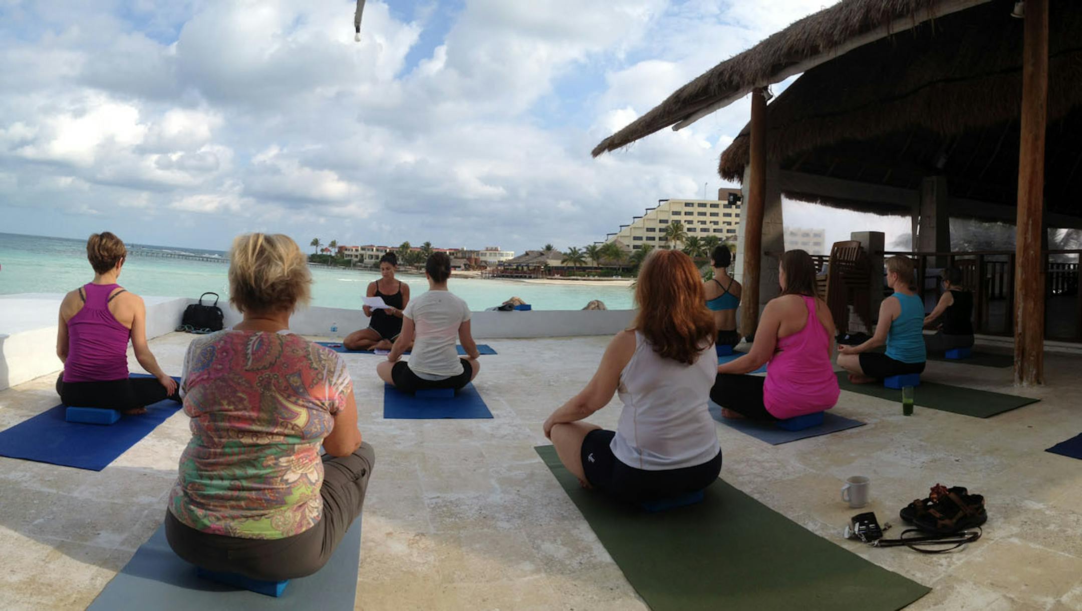 Open-air yoga led by Kathy Flaminio on Mexico's Isla Mujeres. Photo by Dori Johnson