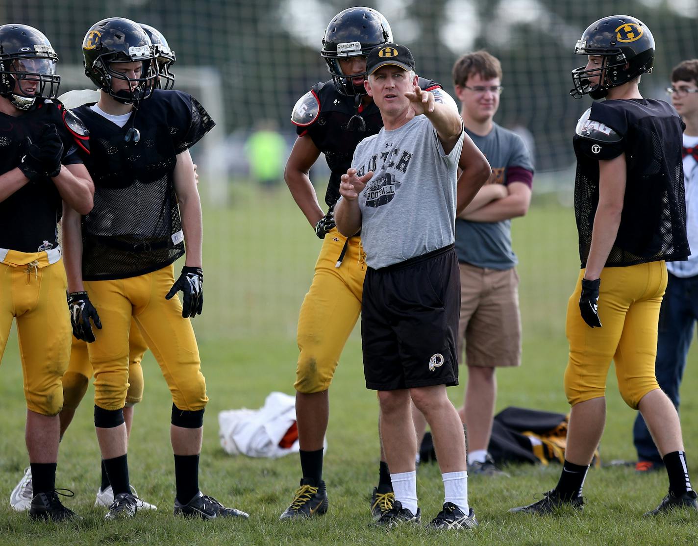 Hutchinson's head coach Andy Rostberg, in 2014