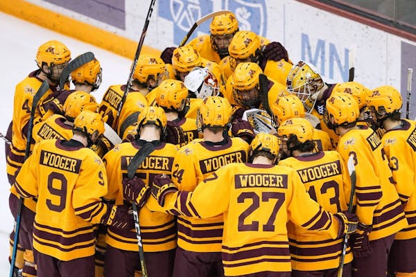 Gophers players all wore Wooger on the back of their jersey during Saturday's game against the Beavers in honor of former Gophers hockey coach Doug Wo