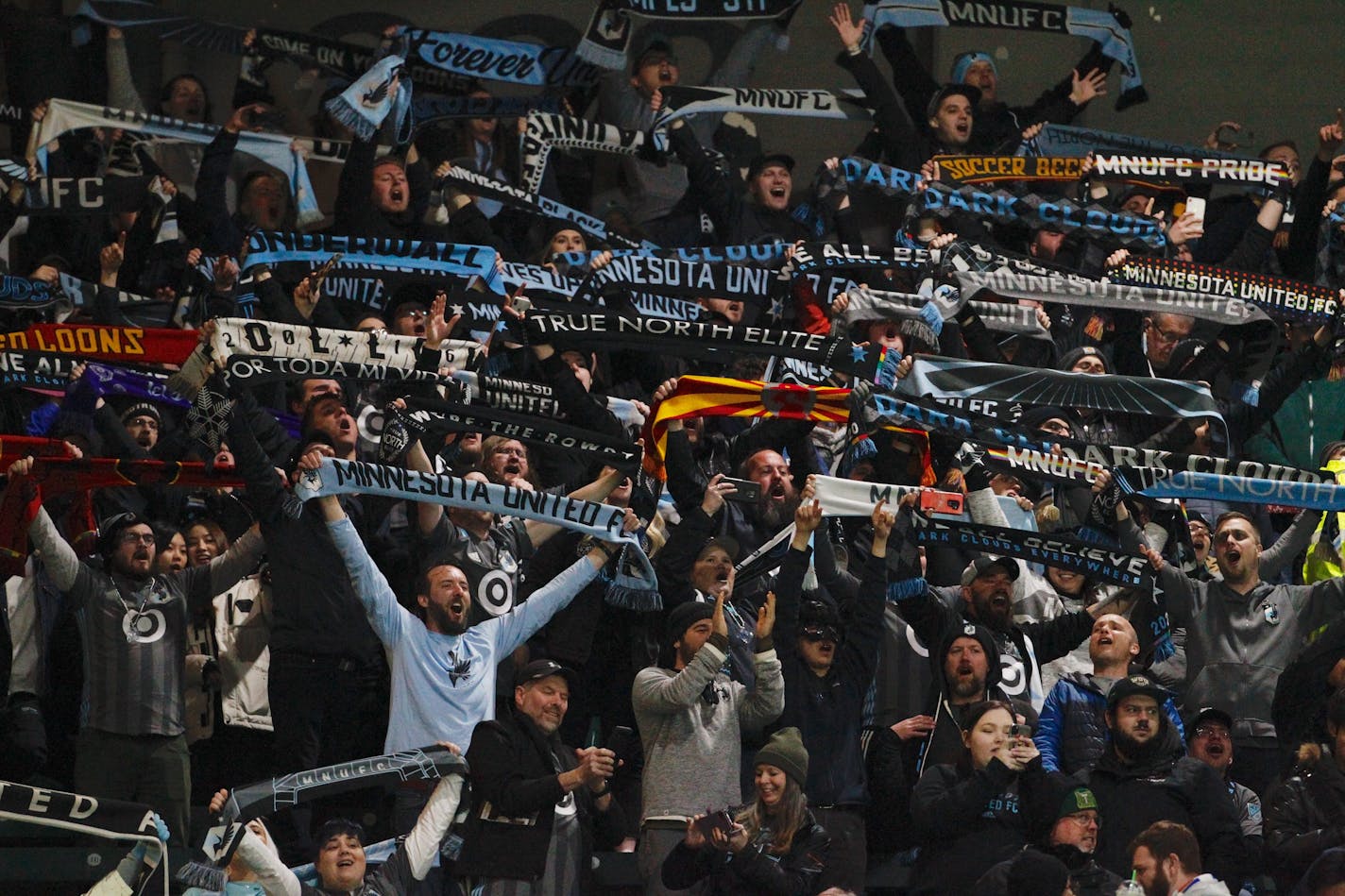 Minnesota United fans celebrate at the end of an MLS soccer match in Portland, Oregon, Sunday, Mar. 1, 2020. (STEVE DIPAOLA/Special to the Star Tribune) ORG XMIT: MIN2003012118110672