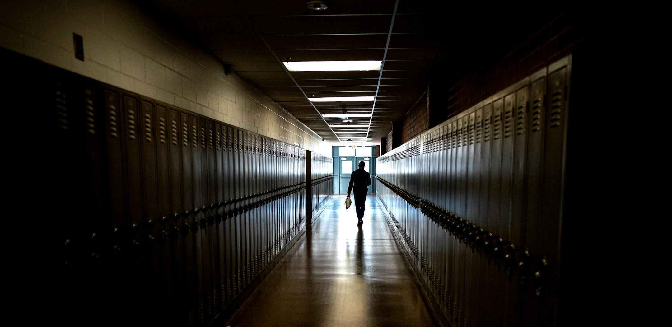 A track and field athlete walked down the hall at Apple Valley High School.