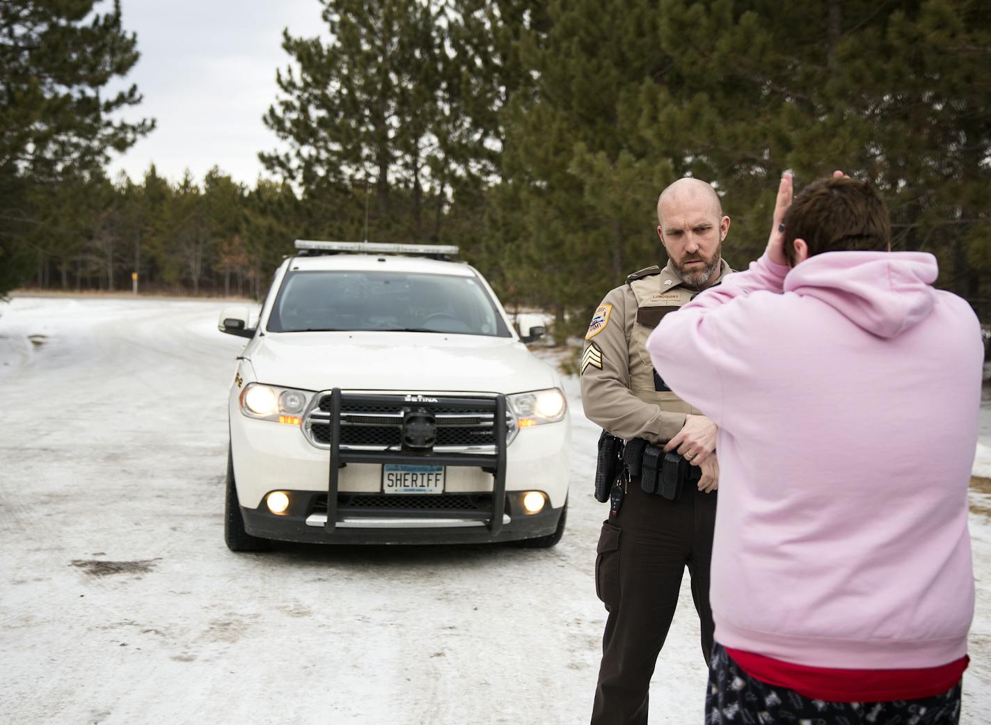 Sgt. Sam Lundquist answers a call from a woman who claimed to be hallucinating voices that told her to hurt herself at REM North Star, a supported living facility for adults with mental and physical disabilities in Turtle River, Minn. on Tuesday, January 27, 2015. Sgt. Lundquist ended up taking the woman to the Sanford Bemidji Medical Center emergency room for a voluntary mental health evaluation. This was her third visit to the emergency room in two days. ] LEILA NAVIDI leila.navidi@startribune