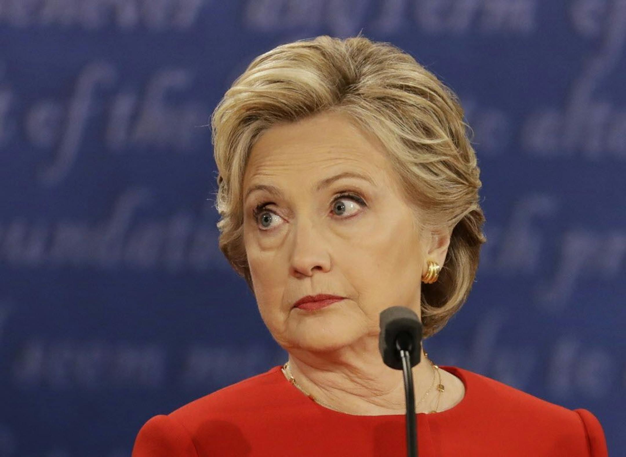 Democratic presidential nominee Hillary Clinton listens to Republican presidential nominee Donald Trump during the presidential debate at Hofstra University in Hempstead, N.Y., Monday, Sept. 26, 2016.