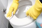 Cleaning the bathroom. (Dreamstime/TNS) ORG XMIT: 1660452