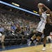 Lynx star Maya Moore, left, drove against the Tulsa Shock's Glory Johnson during Friday's game in front of 9,213 fans at Target Center. The defending 