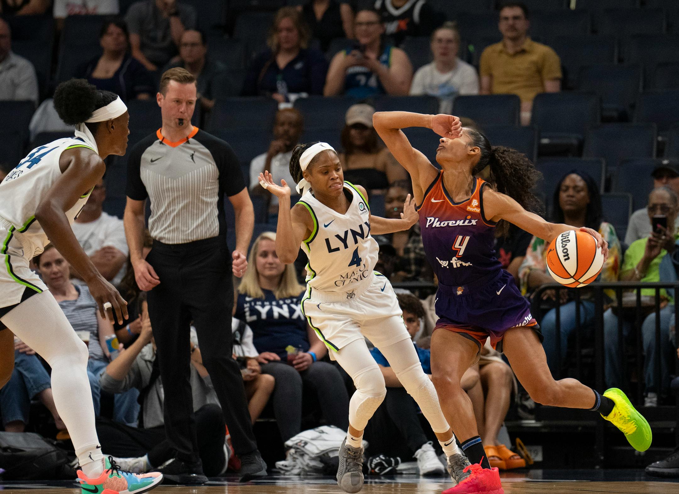 Minnesota Lynx guard Moriah Jefferson (4) fouled Phoenix Mercury guard Skylar Diggins-Smith (4) in the second quarter.