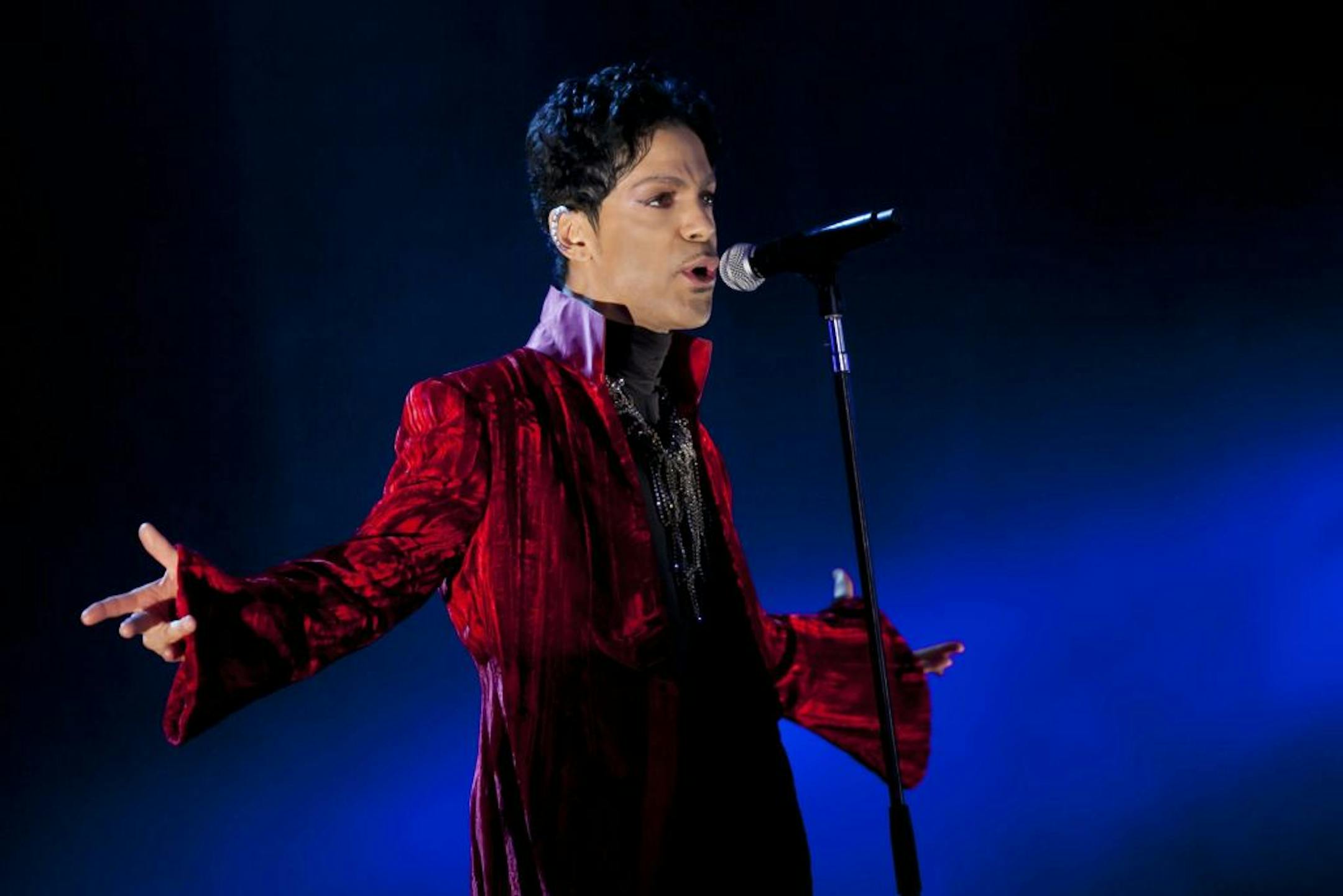 In this picture made available on Wednesday, Aug. 10, 2011, US musician Prince performs during his concert at the Sziget Festival on the Shipyard Island, northern Budapest, Hungary, on Tuesday, Aug. 9, 2011. The Sziget Festival is one of the biggest European cultural events, featuring art exhibitions, literary and theatrical performances, and above all music concerts. The festival runs from Aug. 8 to 15. (AP Photo/MTI, Balazs Mohai) HUNGARY OUT